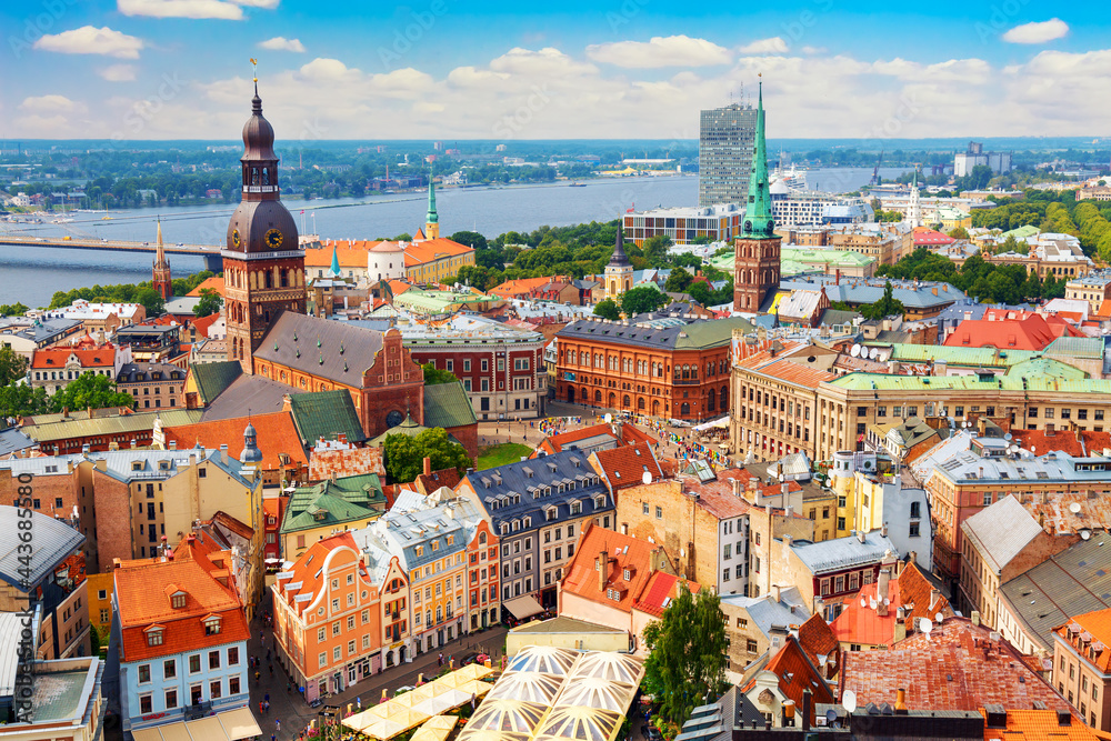 Panoramic view of the old city of Riga, Latvia from the tower Church of St. Peter. Summer sunny day - obrazy, fototapety, plakaty 