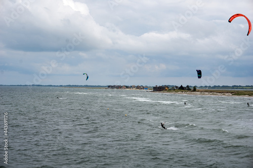 kitesurfer in the stormy baltic sea near heiligenhafen