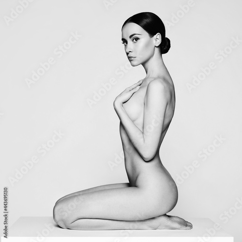 Fashion beautiful brunette with short haircut.  studio portrait
