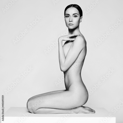 Fashion beautiful brunette with short haircut.  studio portrait