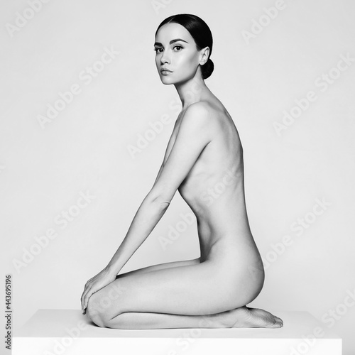 Fashion beautiful brunette with short haircut.  studio portrait
