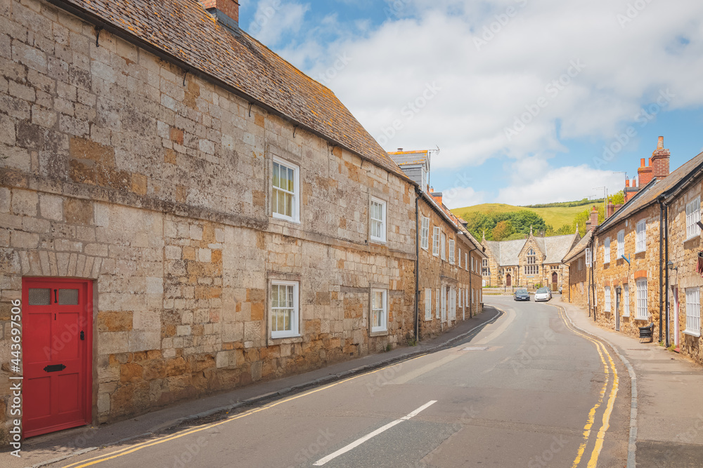 Picturesque old town of the quaint and charming English village of Abbotsbury, Dorset, England, UK on a sunny summer day.