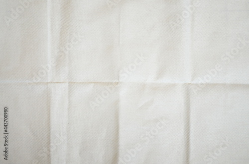 close-up, texture of evenly folded crumpled fabric.
background for text and presentations.
