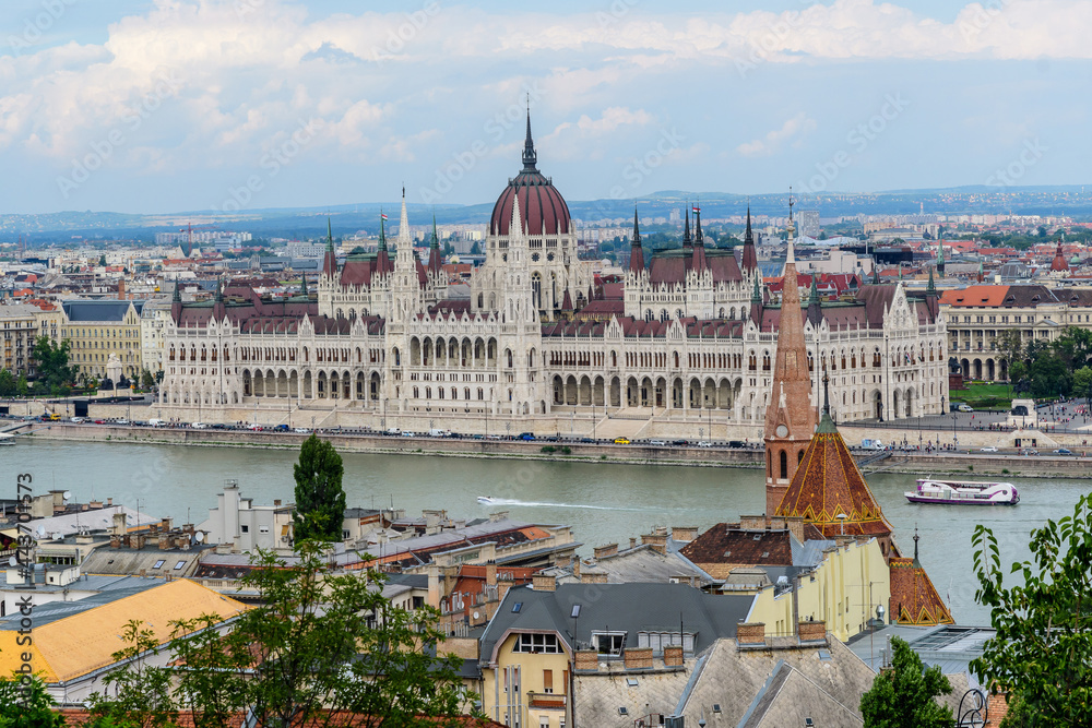 A landscape view of Budapest city with the Hungarian parliament building (Országház) and otherr buildings along Danube river, Hungary.