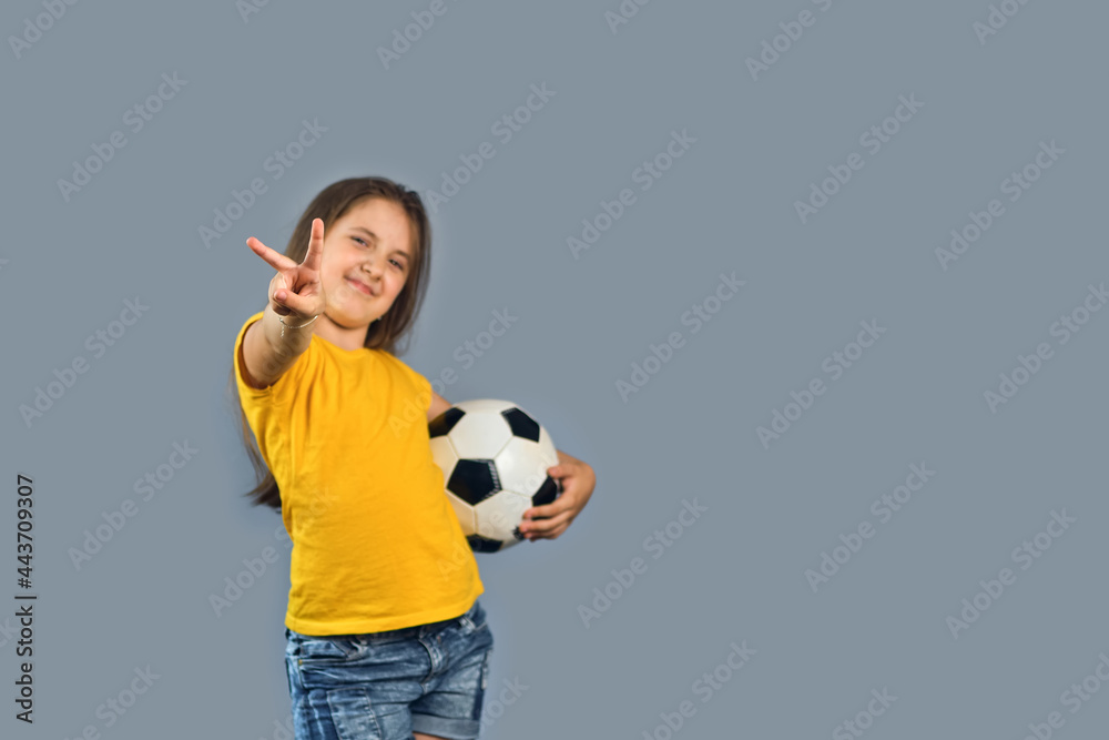 Fan sport girl player hold soccer ball celebrating