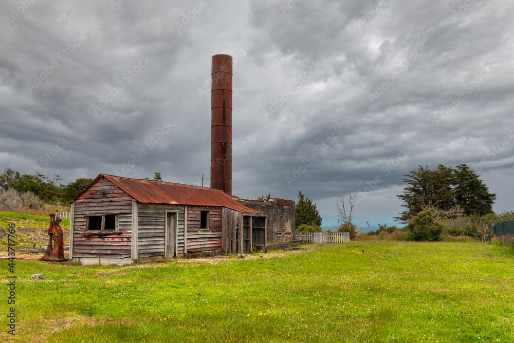 Old mining factory in the ghost town of Waiuta, New Zealand