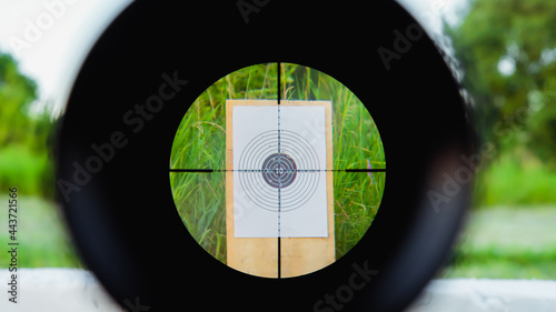 Sniper gun scope view, target photo