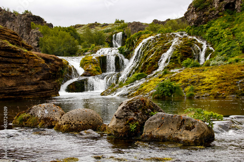 Small waterfalls and rocks in the beautiful Gjáin valley, near Stöng, Iceland
