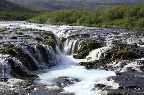 The beautiful blue water of Brúarfoss waterfall, Iceland
