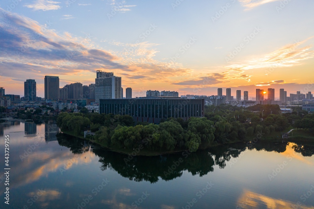 Naklejka premium Skyline by Baijia lake at sunrise in Nanjing city in summer