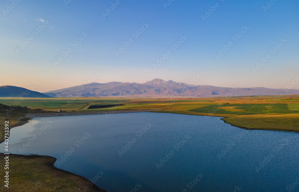 Beautiful sunrise time lapse sky and clouds, panoramic view on the lake and mountains. Beautiful sunrise time lapse sky and clouds, panoramic view on the lake and mountains.