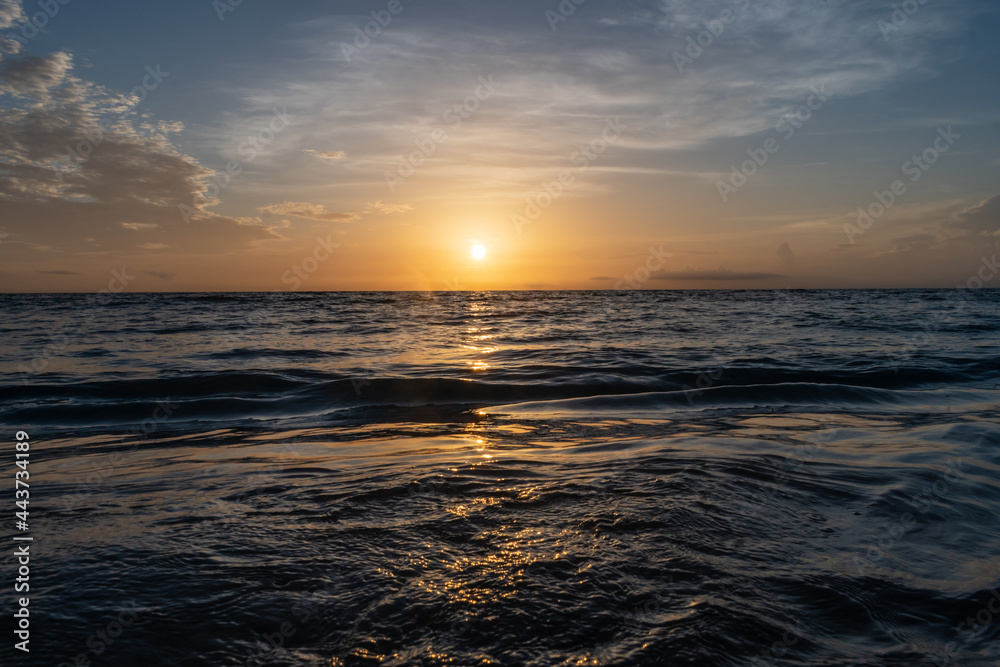 sunlight sunrise reflecting on the water