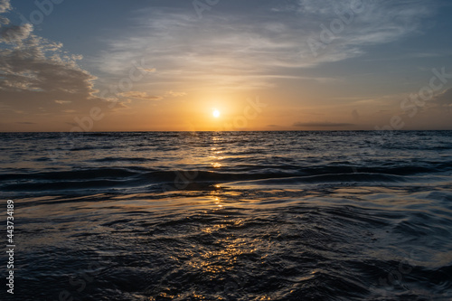 sunlight sunrise reflecting on the water