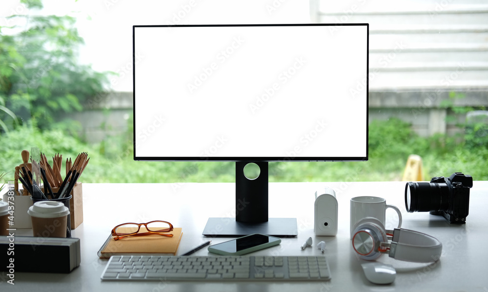 Fototapeta premium Workspace desk and laptop. copy space and blank screen. Business image, Blank screen laptop and supplies. 