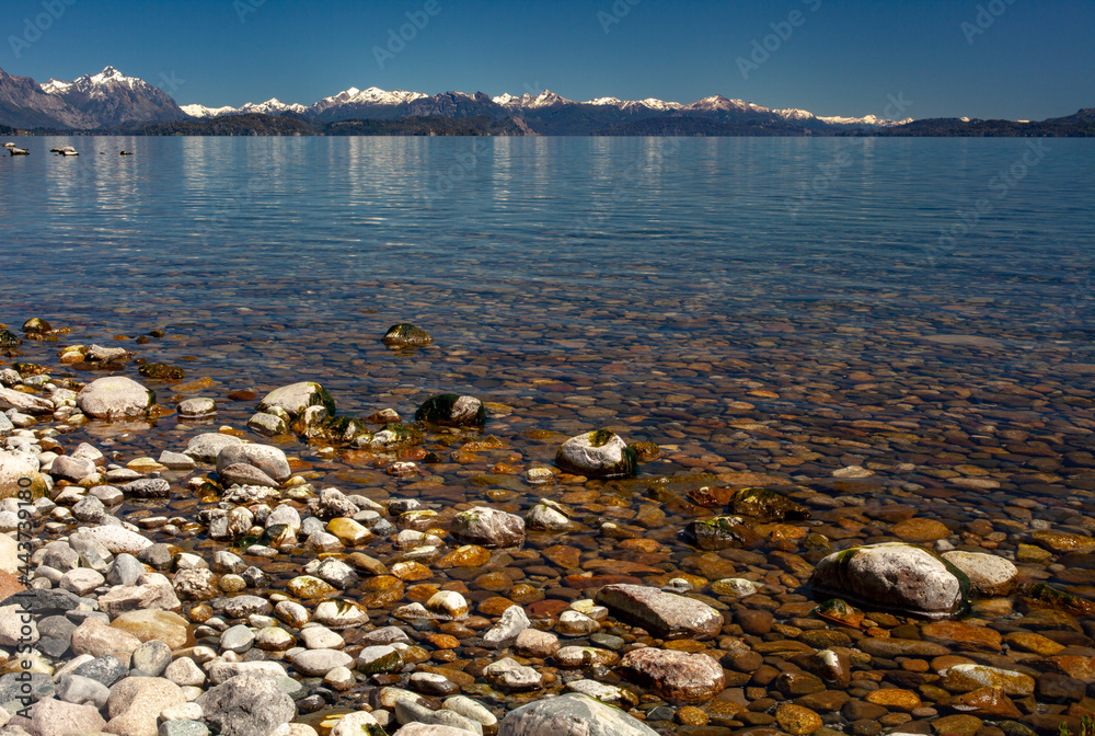 Mountain reflections over the lake at sunset. Scenic travel destination. Bariloche Patagoina Argentina Mountain reflections over the lake at sunset. Scenic travel destination. Bariloche Patagoina Argentina