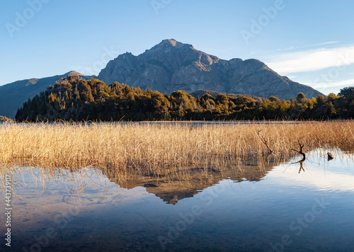 Mountain reflections over the lake at sunset. Scenic travel destination. Bariloche Patagoina Argentina