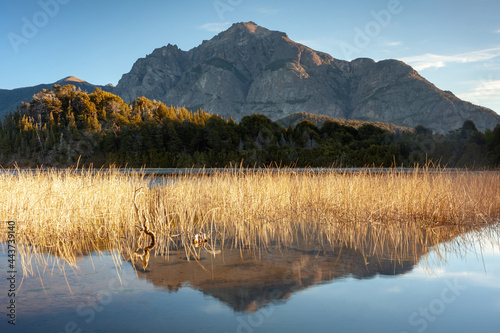 Mountain reflections over the lake at sunset. Scenic travel destination. Bariloche Patagoina Argentina photo