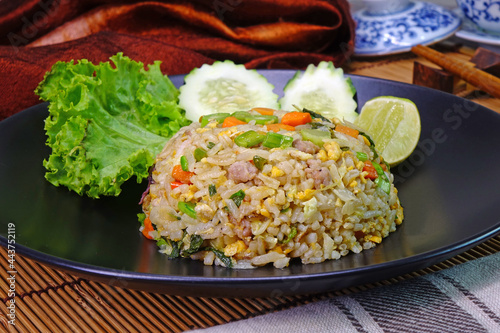 Yangzhou fried rice. Yangzhou fried rice is a popular Chinese-style wok fried rice dish in many Chinese restaurants throughout the world photo