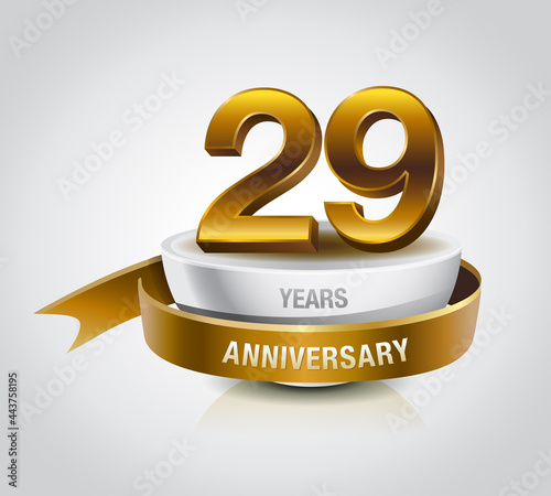 29 years golden anniversary logo celebration with ring and ribbon. photo