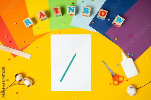 DIY paper rainbow. Ceate a rainbow of colored paper.