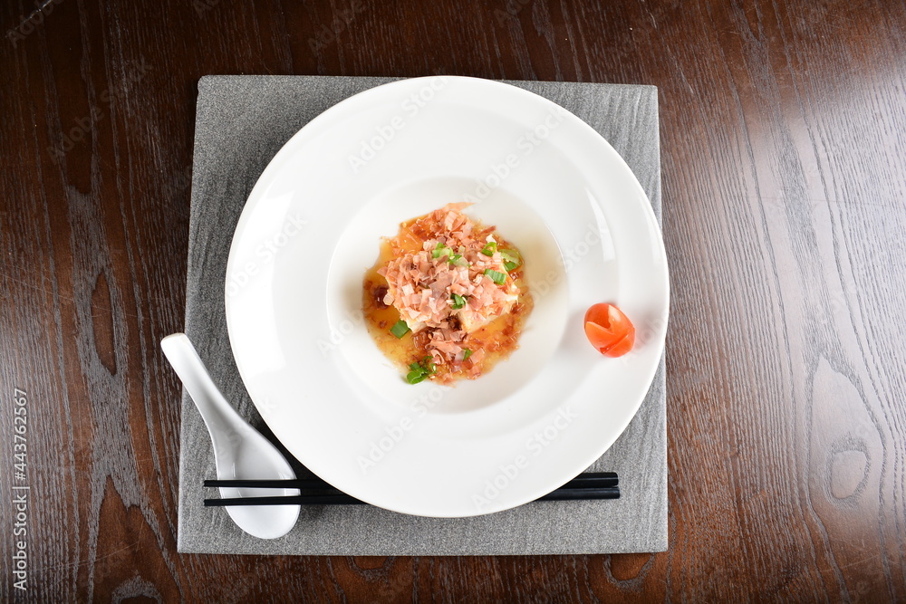 steamed fresh tofu bean curd with Japanese bonito and soy sauce asian in dark background halal menu steamed fresh tofu bean curd with Japanese bonito and soy sauce asian in dark background halal menu