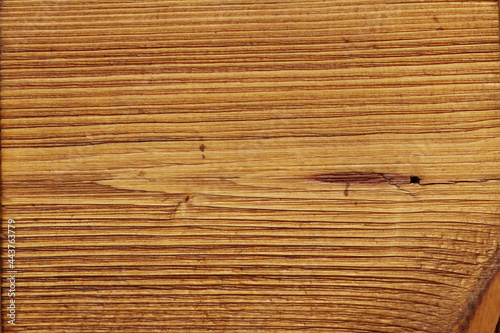 Pine wood texture coated with brown wood oil. 