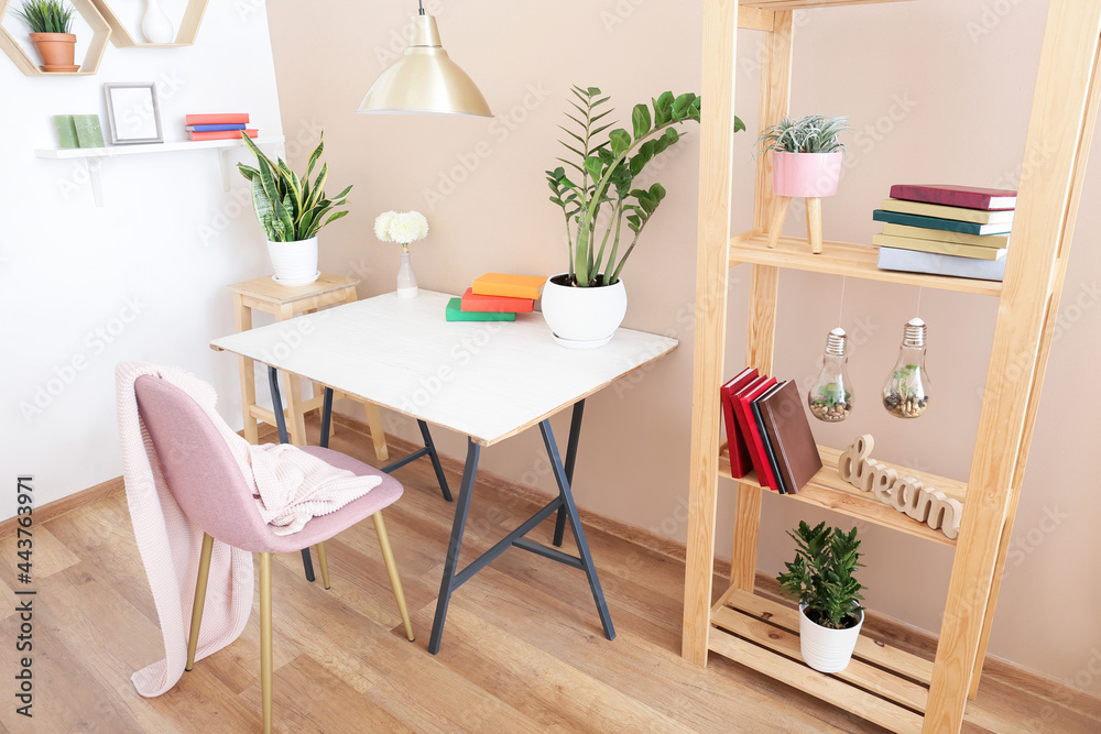 Interior of modern room with shelf unit and table Interior of modern room with shelf unit and table