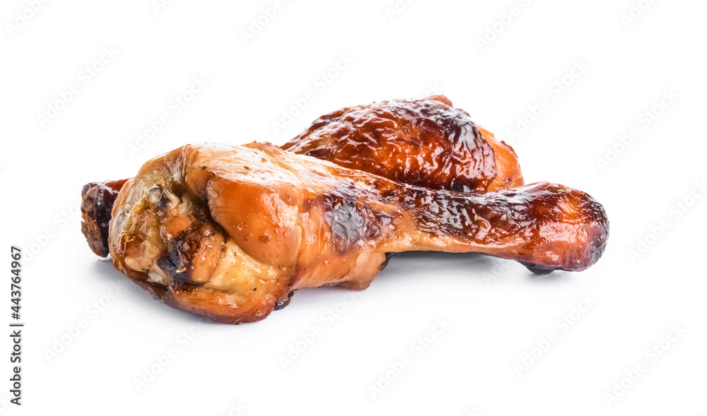Roasted chicken legs on white background Roasted chicken legs on white background