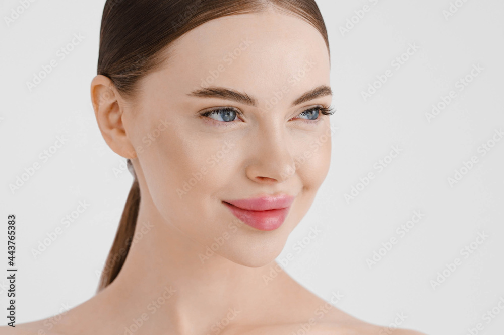 Beautiful woman face healthy skin natural make up lips close up blue eyes