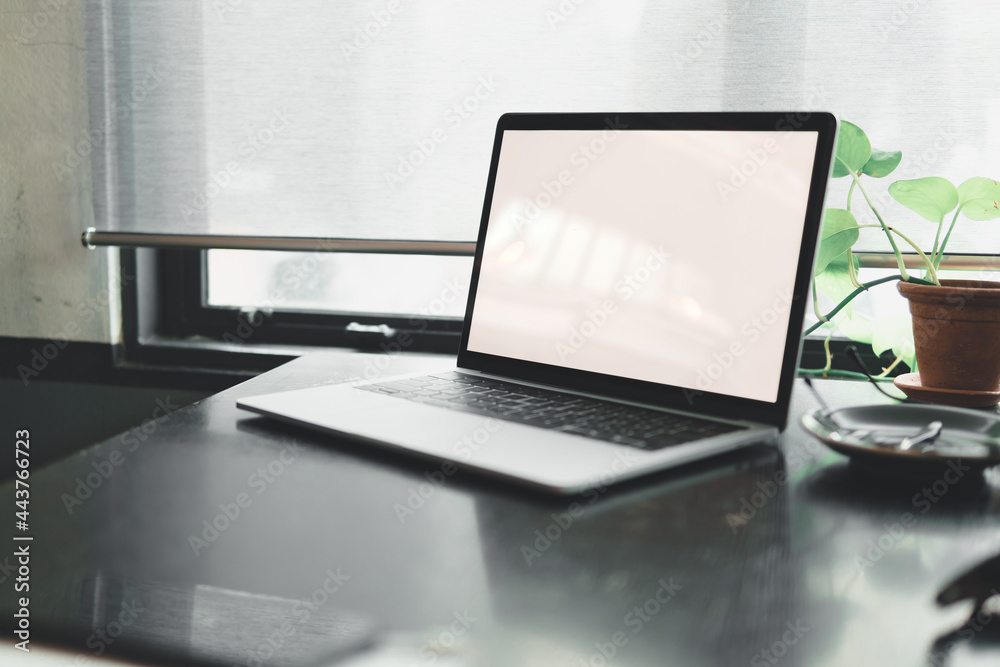 blank laptop screen on working table.Laptop screen template for presentation. blank laptop screen on working table.Laptop screen template for presentation.