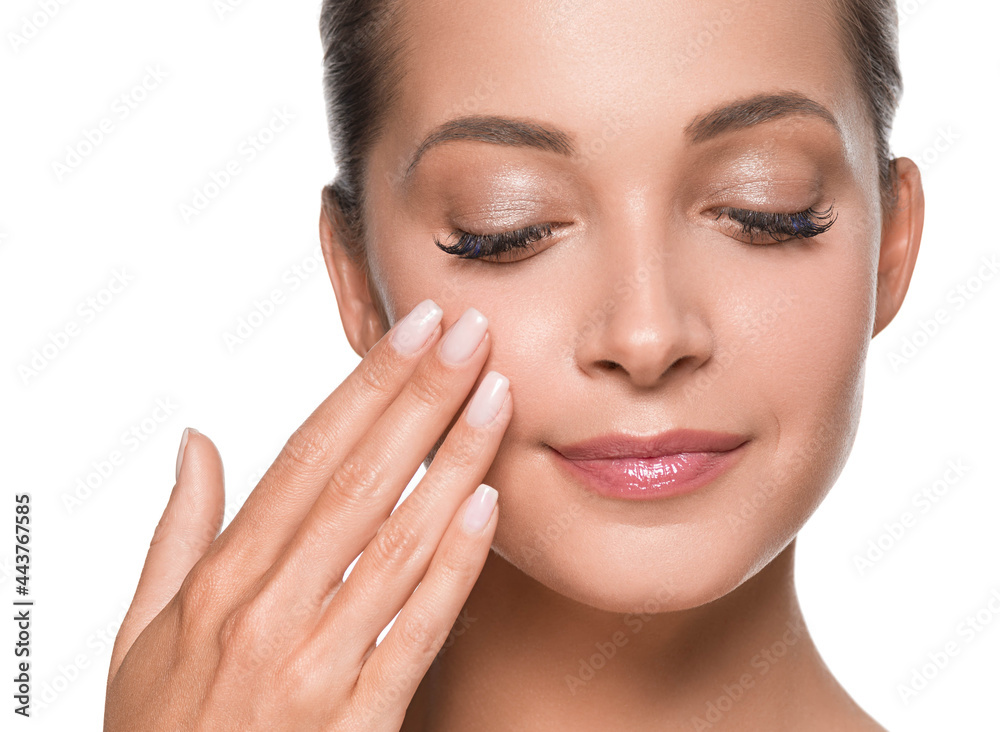 Beautiful woman with healthy clean fresh skin hand touching face manicure beauty isolated on white Beautiful woman with healthy clean fresh skin hand touching face manicure beauty isolated on white