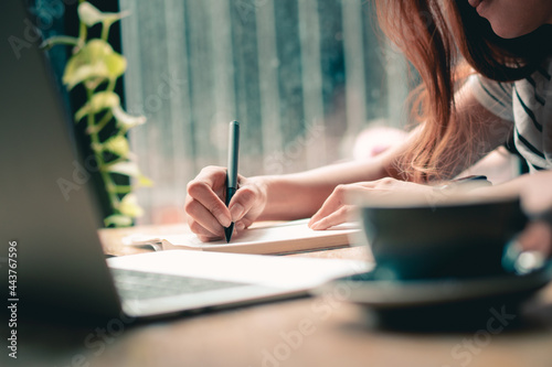 Hands writting close up.Working with document.Woman hands holding pen and listing to do list.Business with paperwork concept.