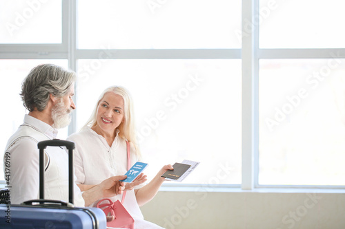 Senior tourists with immune...