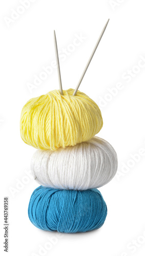 Knitting yarn and needles on white background