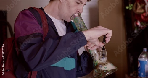 guy smoking a bong