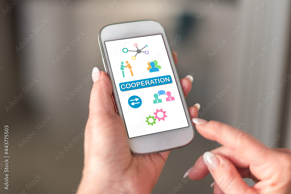 Cooperation concept on a smartphone Cooperation concept on a smartphone
