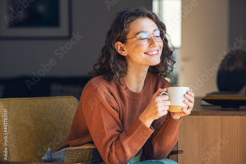 Leinwand Poster Beautiful woman relaxing and drinking hot tea