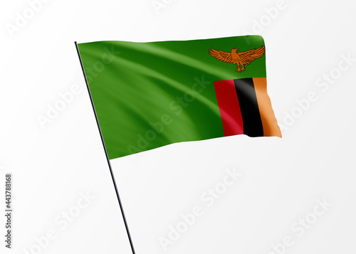 Zambia flag flying high in the isolated background Zambia independence day. World national flag collection photo