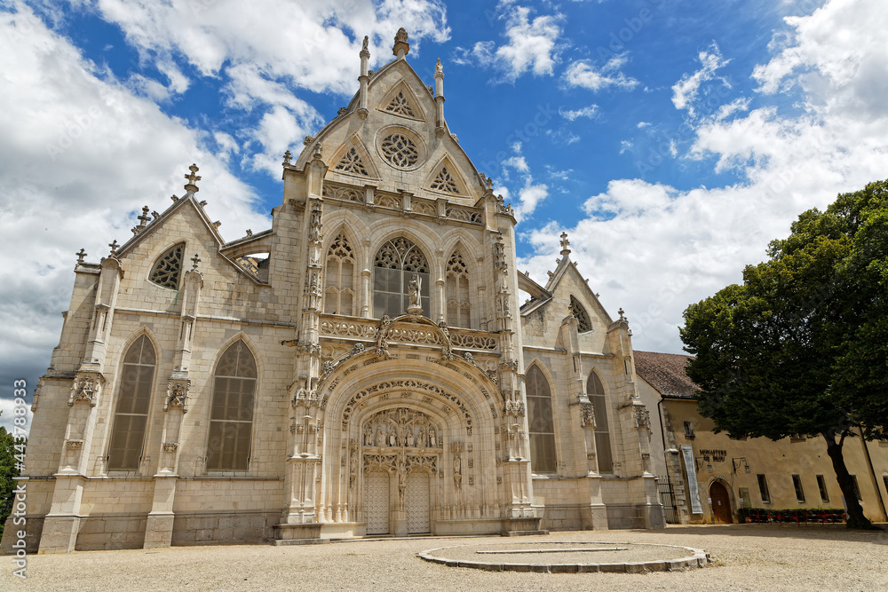 BOURG-EN-BRESSE, FRANCE, June 29, 2021 : Outdoor view of main facade of the church of Brou Royal Monastery