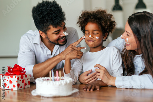 Photography Happy family celebrating a birthday together at home