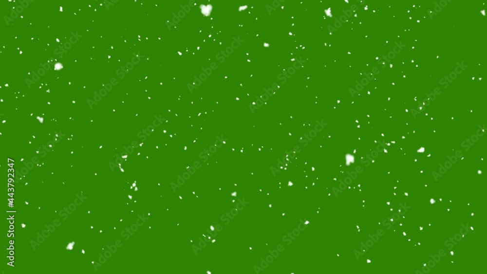 Snow falling on green background Snow falling on green background