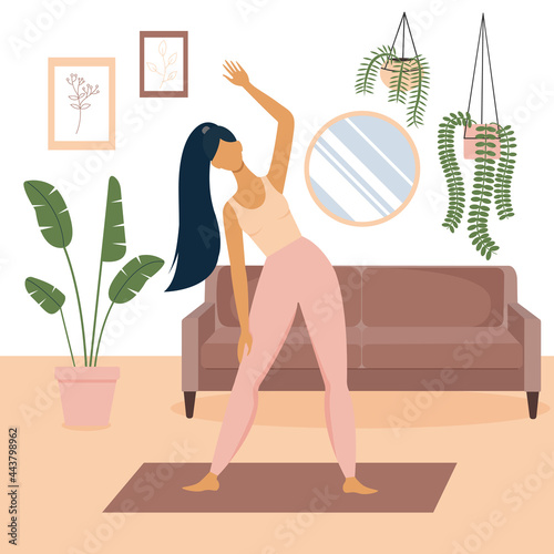 Exercising beautiful woman at home in the living room. Strong girl doing sport exersice indoor. Healthy and active lifestyle concept. Female character takes care of her body with cardio training