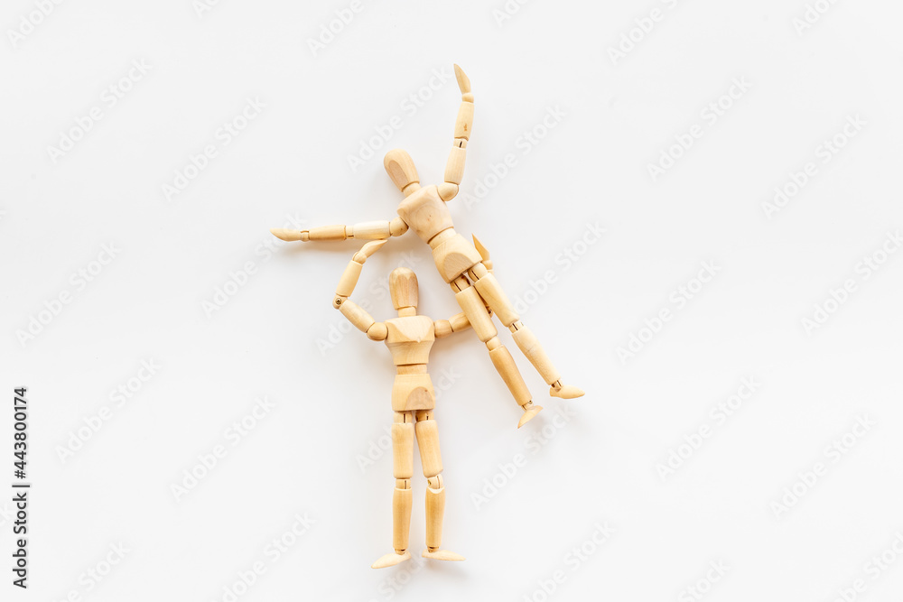 Connection couple - two wooden mannequin figurine communication Connection couple - two wooden mannequin figurine communication