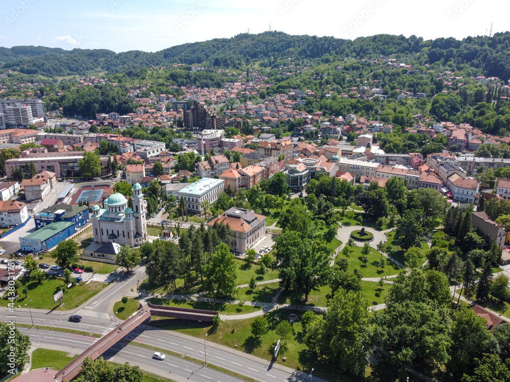 Aerial drone view of city of Tuzla, Bosnia and Herzegovina. Buildings, streets and residential houses. Tuzla is a town and municipality in north BiH, Europe.	