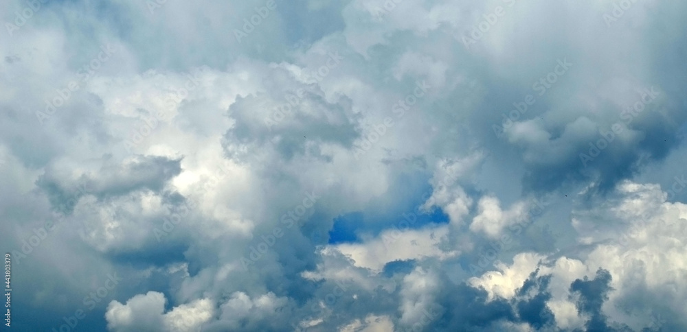 Obraz premium Blue sky background with clouds.