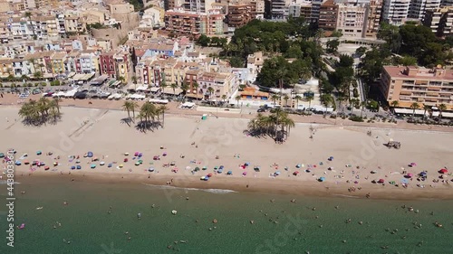 Vistas Aéreas de la Playa de Villajoyosa o La Vila Joiosa de Alicante en España, con sus vistosas fachadas tradicionales de vivos colores. photo