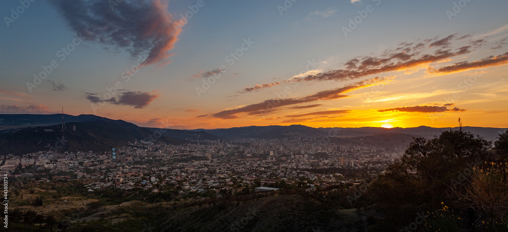 Beautiful view of Tbilisi at sunset, capital of Georgia