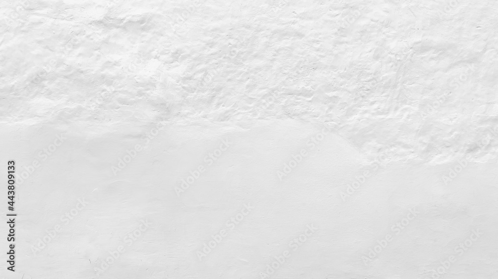 White wall with plastering relief pattern, background texture