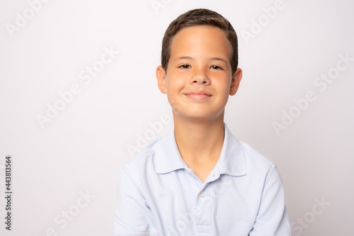 Photo of adorable young happy boy looking at camera.