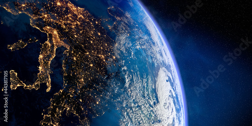 Planet Earth with precise relief and volumetric atmosphere. Day-night transition. Europe. Mediterranean Sea and Italy in the foreground. 3D rendering. Elements of this image furnished by NASA